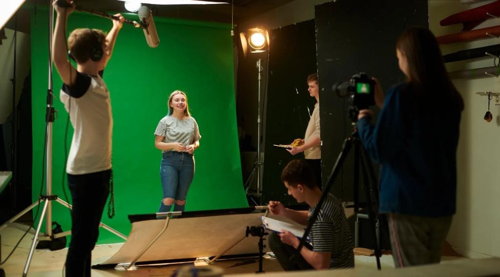 Green screen photo booth with custom branded backgrounds
